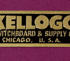 KELLOGG SWITCHBOARD & SUPPLY CO. BRASS LABEL FOR ANTIQUE OAK TELEPHONEL B-9986
